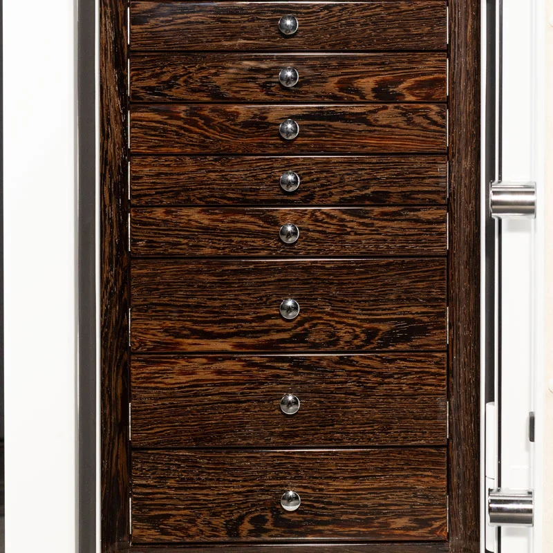 Detail — eleven high gloss wenge drawers with polished chrome pulls